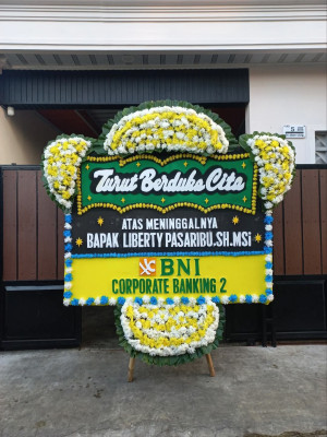Papan Bunga Duka di Baya Biru