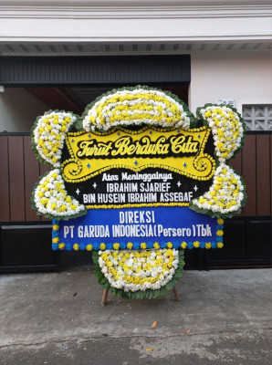 Papan Bunga Duka di Baya Biru